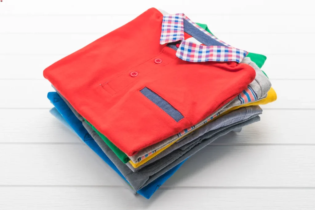 Folded stack of clothes - Tech Cloud Ltd