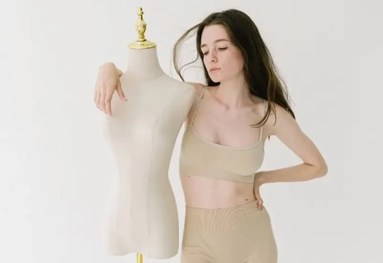 Ghost mannequin image editing service showcasing a girl holding a mannequin, illustrating advanced image post-production services